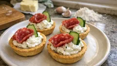 Slané košíčky s česnekovou pomazánkou: křehké jednohubky na oslavu